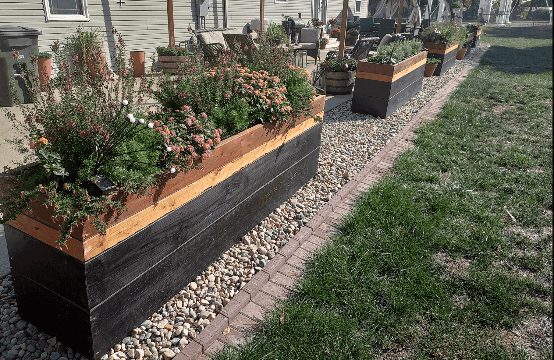 raised beds along side apartment building